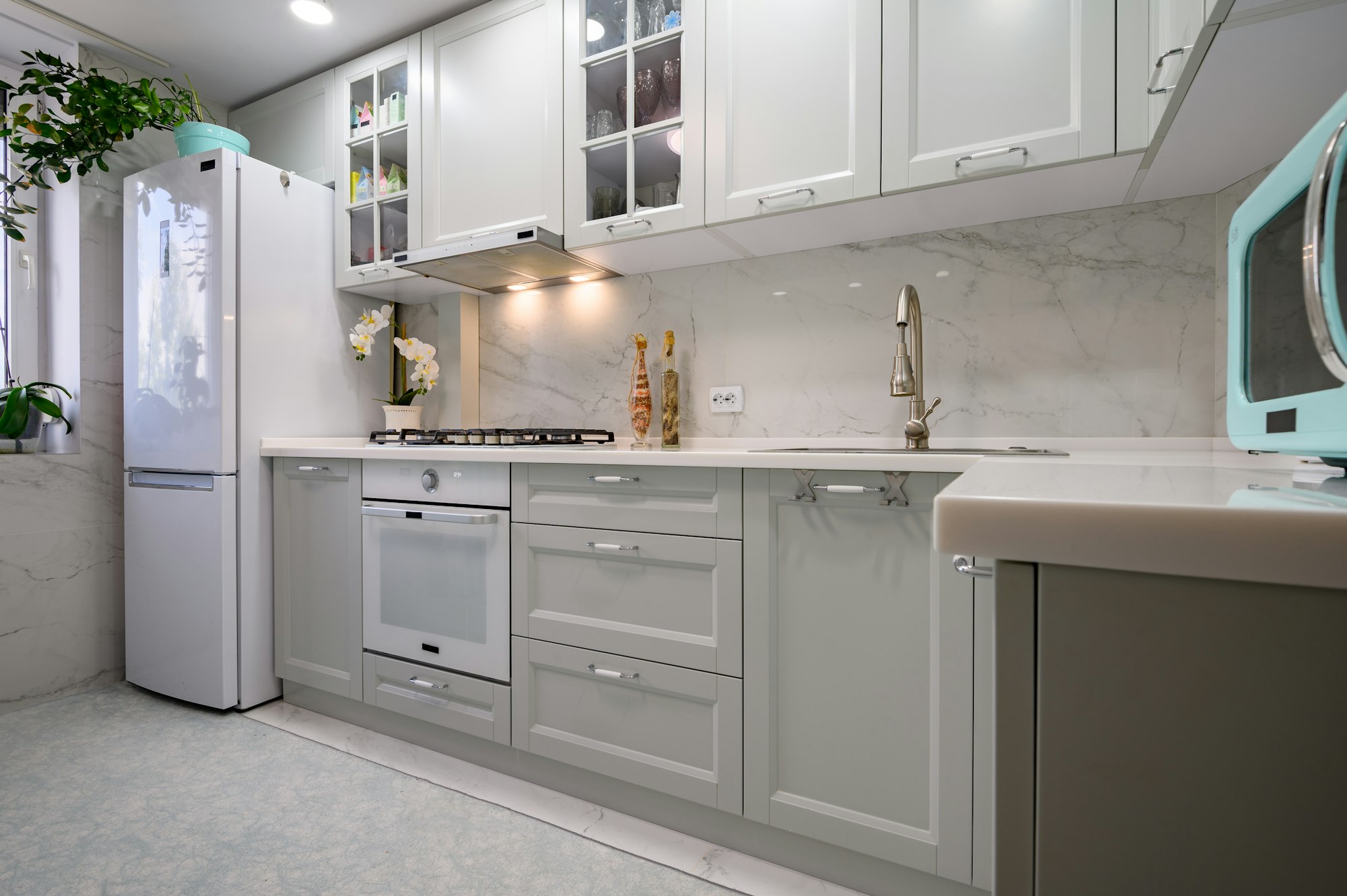 New light grey modern well designed kitchen interior